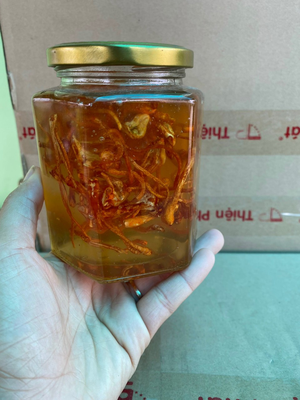 Mật ong ngâm hoa đu đủ đực 