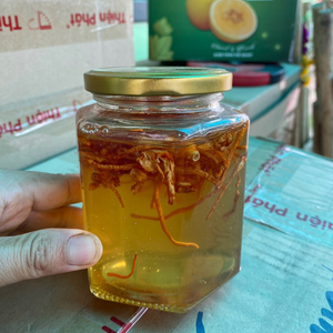 Mật ong ngâm hoa đu đủ đực 