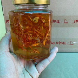 Mật ong ngâm hoa đu đủ đực 
